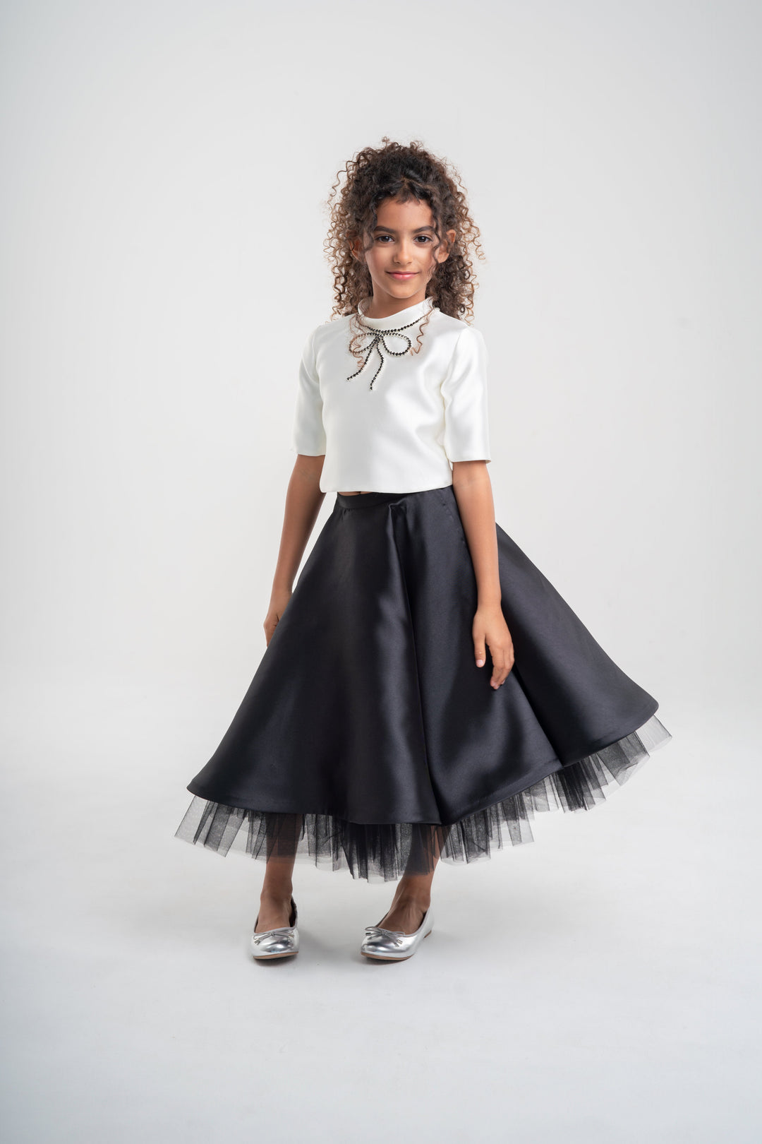 Girls' White Top with Black Skirt