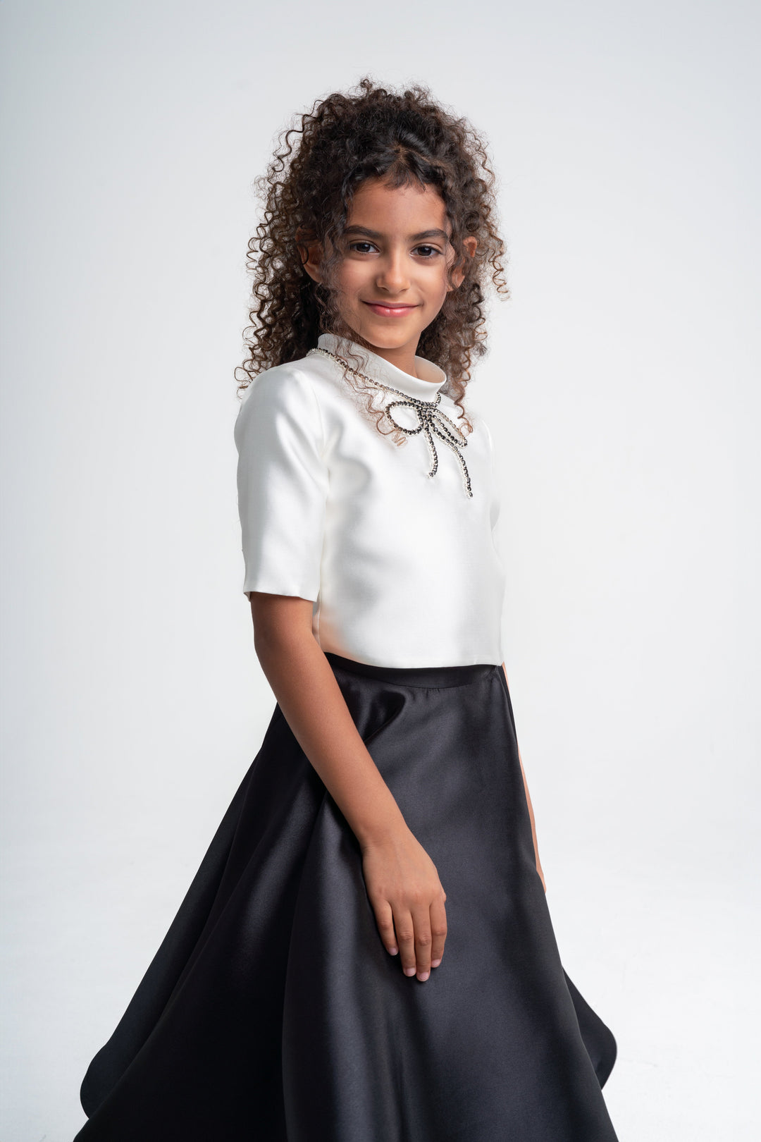 Girls' White Top with Black Skirt