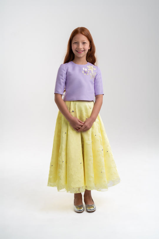 girls lavender top with floral yellow skirt video