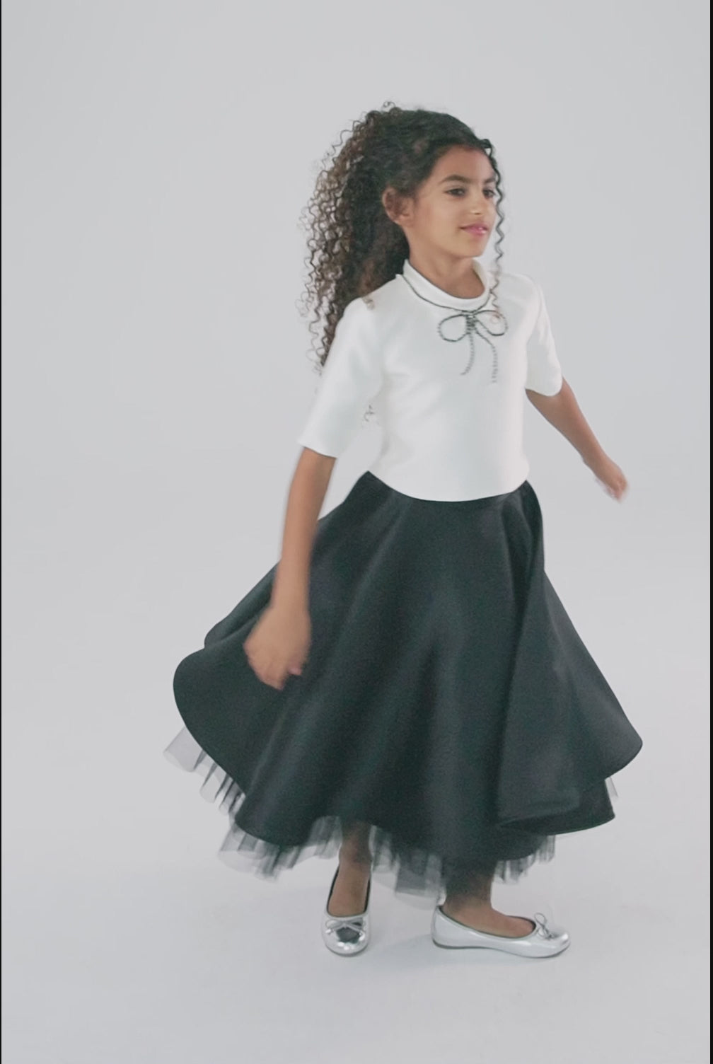 Girls' White Top with Black Skirt